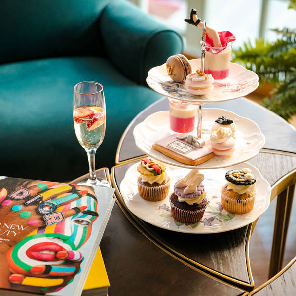 Excelsior Hotel fashion sweets on a lobby table with champagne