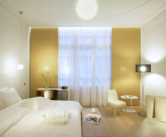 The Excelsior Hotel Junior Suite room lit up