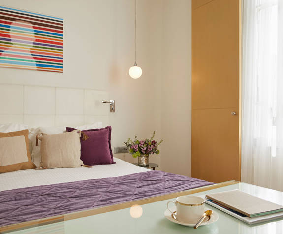 The Excelsior Hotel Deluxe Room decorations and amenities